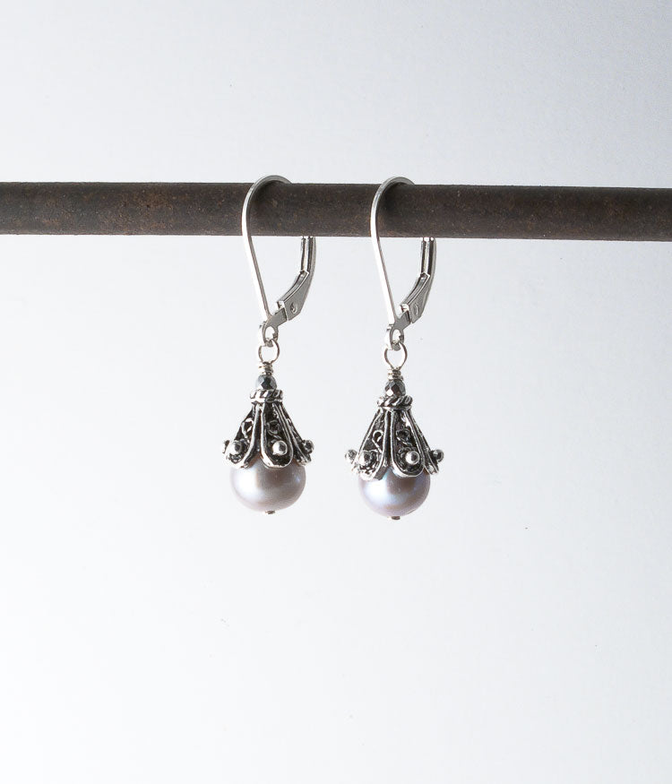 Freshwater pearl, Balinese sterling. 

Earrings, 1.25"